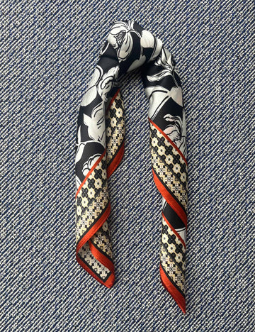 Silk scarf black/white flower/orange graphic