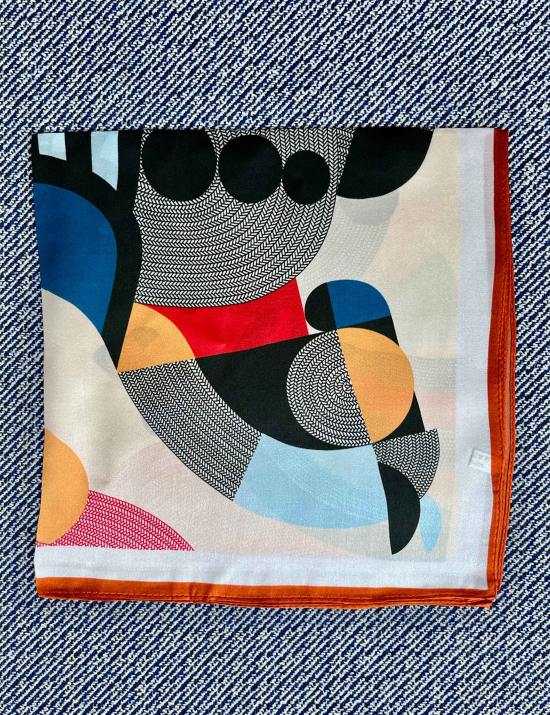 Silk scarf cream/orange/red/blue graphic