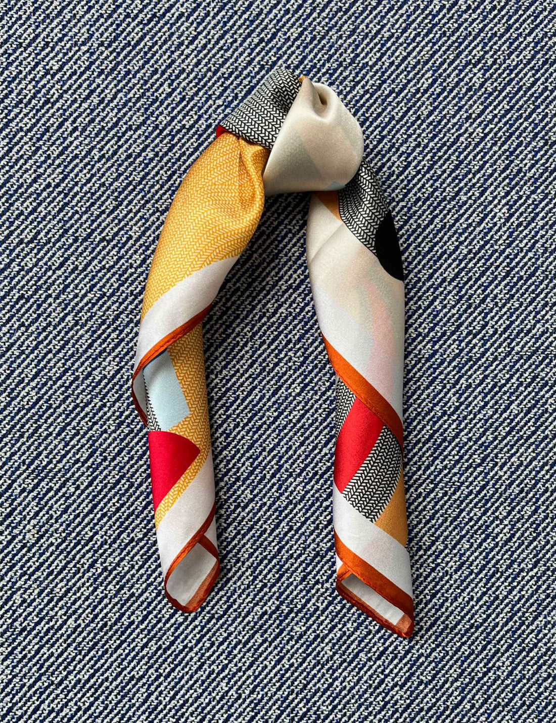 Silk scarf cream/orange/red/blue graphic
